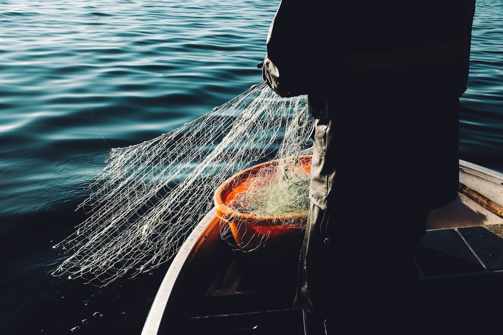 Fishing crew hauling a net